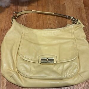 Yellow coach purse and matching coach wallet